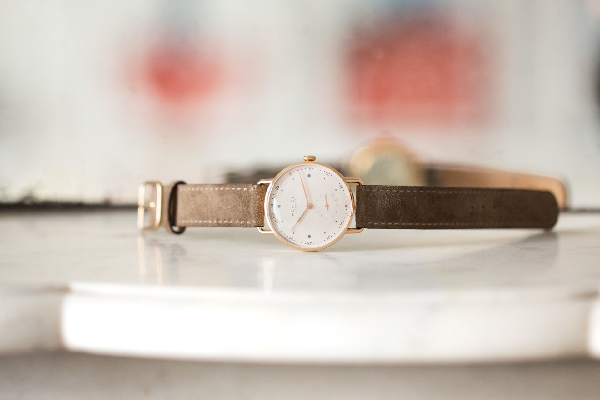 Nomos Glashütte Metro or rose 33